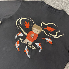 Derschutze trendy cartoon embroidered T-shirts for men and women, round neck, casual loose short-sleeved tops.