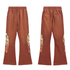 WHO DECIDES WAR Graphic Flare Pants Brown Unisex Wide Leg Streetwear Sweatpants