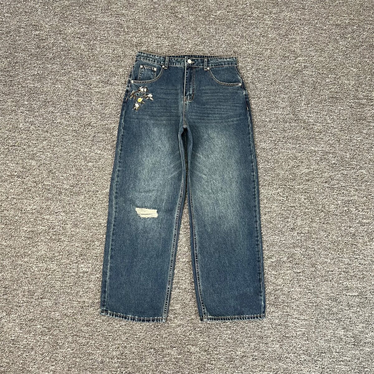 Derchutze niche retro ripped jeans for men and women, high street style, vibe embroidered loose silhouette casual trousers.
