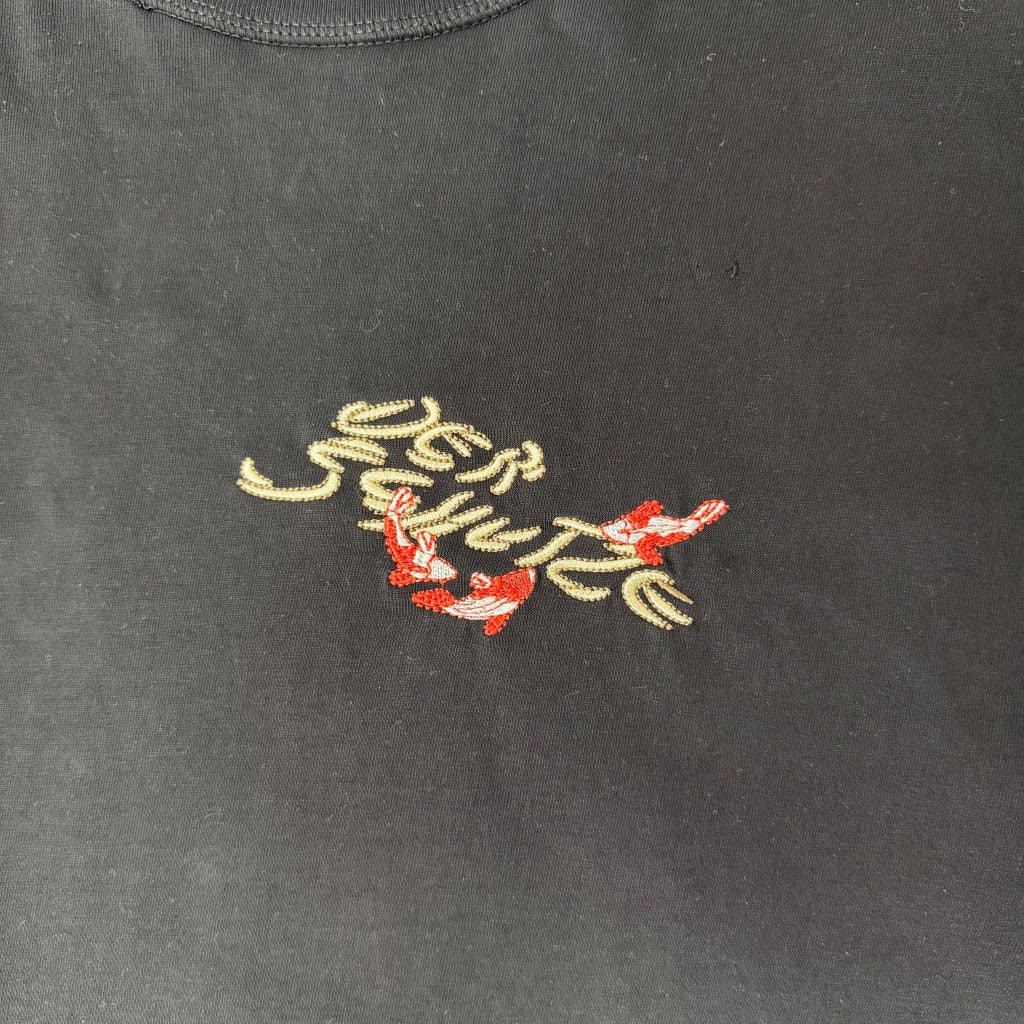 Derschutze trendy cartoon embroidered T-shirts for men and women, round neck, casual loose short-sleeved tops.