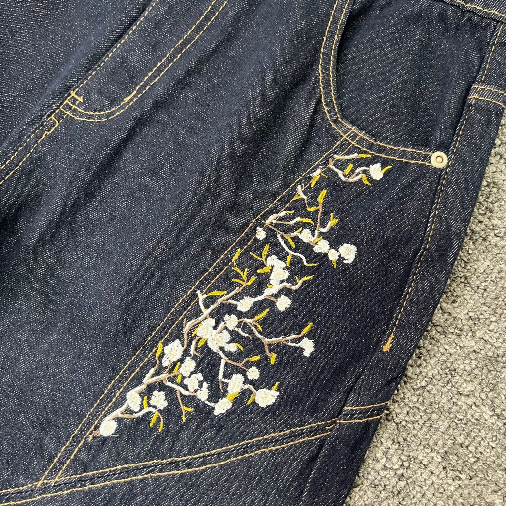 Derschutze trendy floral embroidered patchwork jeans for men and women, high street style, loose straight leg casual trousers.